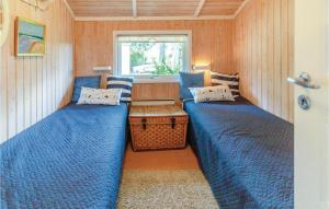 Postel nebo postele na pokoji v ubytování Holiday Home Enøvej Rude I