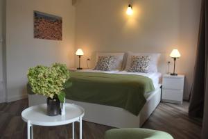 Кровать или кровати в номере Charming Stone House in Cavtat Old Town