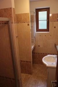 Kúpeľňa v ubytovaní Apartmány Olympia