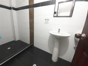 Koupelna v ubytování Hotel Arcoiris Girardot