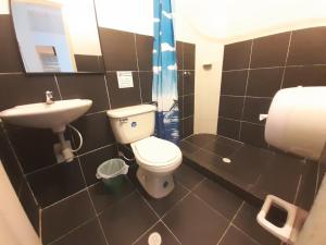 Koupelna v ubytování Hotel Arcoiris Girardot
