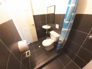 Koupelna v ubytování Hotel Arcoiris Girardot