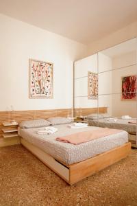 Vuode tai vuoteita majoituspaikassa Cà Venier