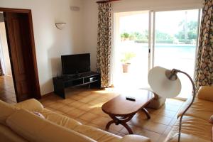 Posezení v ubytování Chalets Torre Nova