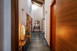 Postel nebo postele na pokoji v ubytování Eco Hotel Boutique & Spa Capitulo Trece - Adults Only