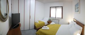 Postel nebo postele na pokoji v ubytování Rosa Garden B&B
