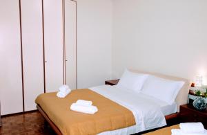 Postel nebo postele na pokoji v ubytování Rosa Garden B&B