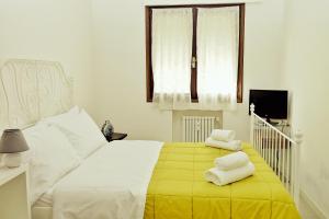 Postel nebo postele na pokoji v ubytování Rosa Garden B&B