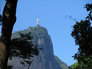 a cross on top of a mountain at Apartamento de Férias Copacabana Rio de Janeiro in Rio de Janeiro