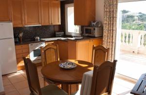 Kuchyň nebo kuchyňský kout v ubytování Chalets Torre Nova