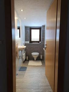 Un baño de Apart Piz Mondin