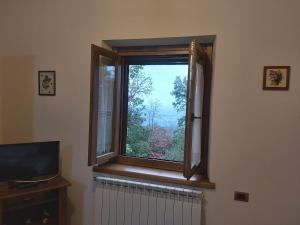 A television and/or entertainment centre at Agriturismo Il Morello