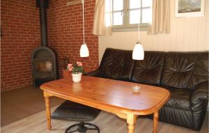 Posezení v ubytování Three-Bedroom Holiday Home In Hemmet