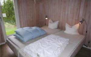 Postel nebo postele na pokoji v ubytování Holiday Home Laxtonvej Humble Denm