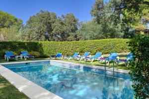 The swimming pool at or near Villa with private pool and garden in Marbella