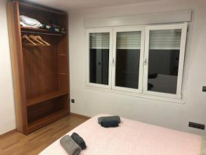 Postel nebo postele na pokoji v ubytování Ílios Soho Apartamentos