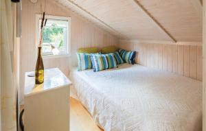 Postel nebo postele na pokoji v ubytování Holiday Home Enøvej Rude I