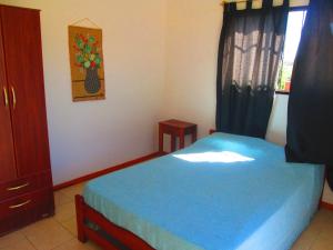 Postel nebo postele na pokoji v ubytování Cabañas Mingo y Mariute