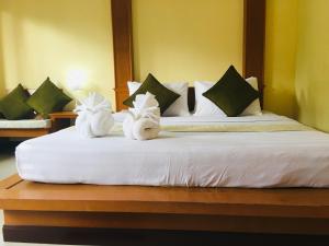 Łóżko lub łóżka w pokoju w obiekcie Lanta Nature House