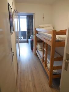 Ένα ή περισσότερα κρεβάτια σε δωμάτιο στο SKI DORIS 310 Flaine Forêt