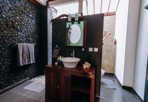 Ένα μπάνιο στο Villa Bukit Malas