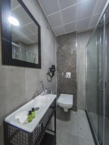 ห้องน้ำของ Grand Esen Hotel