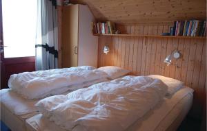 Postel nebo postele na pokoji v ubytování Holiday Home Nymandsbjerg Hvide Sande Xi