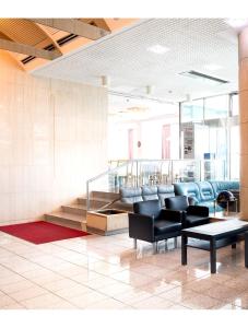 Posezení v ubytování Hotel Yutaka Wing