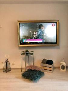 Een TV en/of entertainmentcenter bij Bucharest Central Studio
