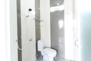 Koupelna v ubytování Griya Mulya near Alun Alun Batu Mitra RedDoorz