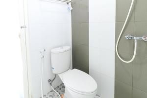 Koupelna v ubytování Griya Mulya near Alun Alun Batu Mitra RedDoorz