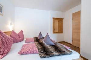 Łóżko lub łóżka w pokoju w obiekcie Appartement Einödberg