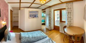 Postel nebo postele na pokoji v ubytování Chalet Neuhaus