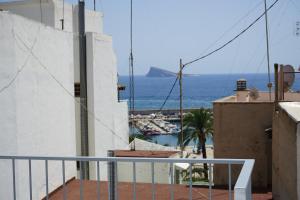 a balcony with a view of the ocean at Pescadors Apartamentos TRG in Benidorm