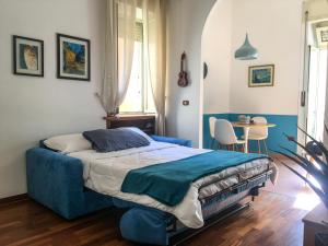 Letto o letti in una camera di La Casa di Simba - Napoli