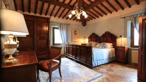 Ліжко або ліжка в номері Villa Giuncheto