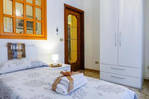Postel nebo postele na pokoji v ubytování Don Alfonso Apartaments
