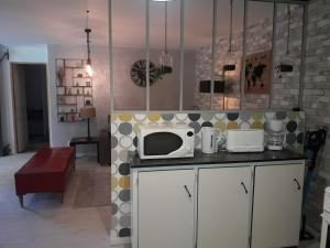 Kuchyň nebo kuchyňský kout v ubytování Le relais champêtre