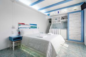 Orizontes Boutique Studios客房内的一张或多张床位