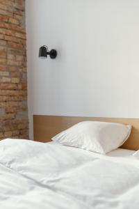 Posteľ alebo postele v izbe v ubytovaní Owntown Apart Hotel