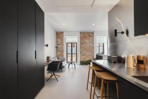 Kuchyňa alebo kuchynka v ubytovaní Owntown Apart Hotel