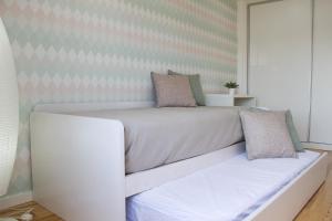 Uma cama ou camas num quarto em Varandas do Nabão