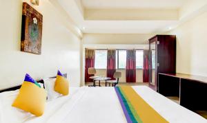 Postel nebo postele na pokoji v ubytování Itsy Hotels Aditya + 20 fotografií