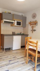 Kuchyň nebo kuchyňský kout v ubytování Perthuis 11D - Appartement 5 pers - Chatel Reservation