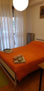 Säng eller sängar i ett rum på Civico 22 Pisa