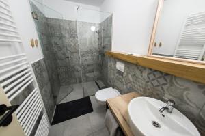 Ein Badezimmer in der Unterkunft Penzion Šťastný medvěd