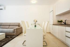 Posezení v ubytování Lux Apartment Teodora Rafailovici