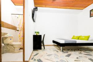 Cama o camas de una habitación en Ayenda 1411 Caney Sede Ingenio