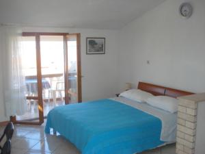 Cama o camas de una habitación en Apartments Zdenka