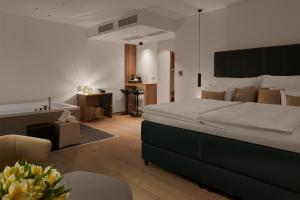 Postel nebo postele na pokoji v ubytování Hotel Passage